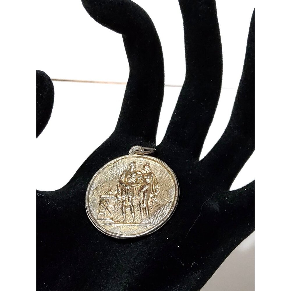 Vintage Silver-Tone Medallion Pendant With Roman Figures Design